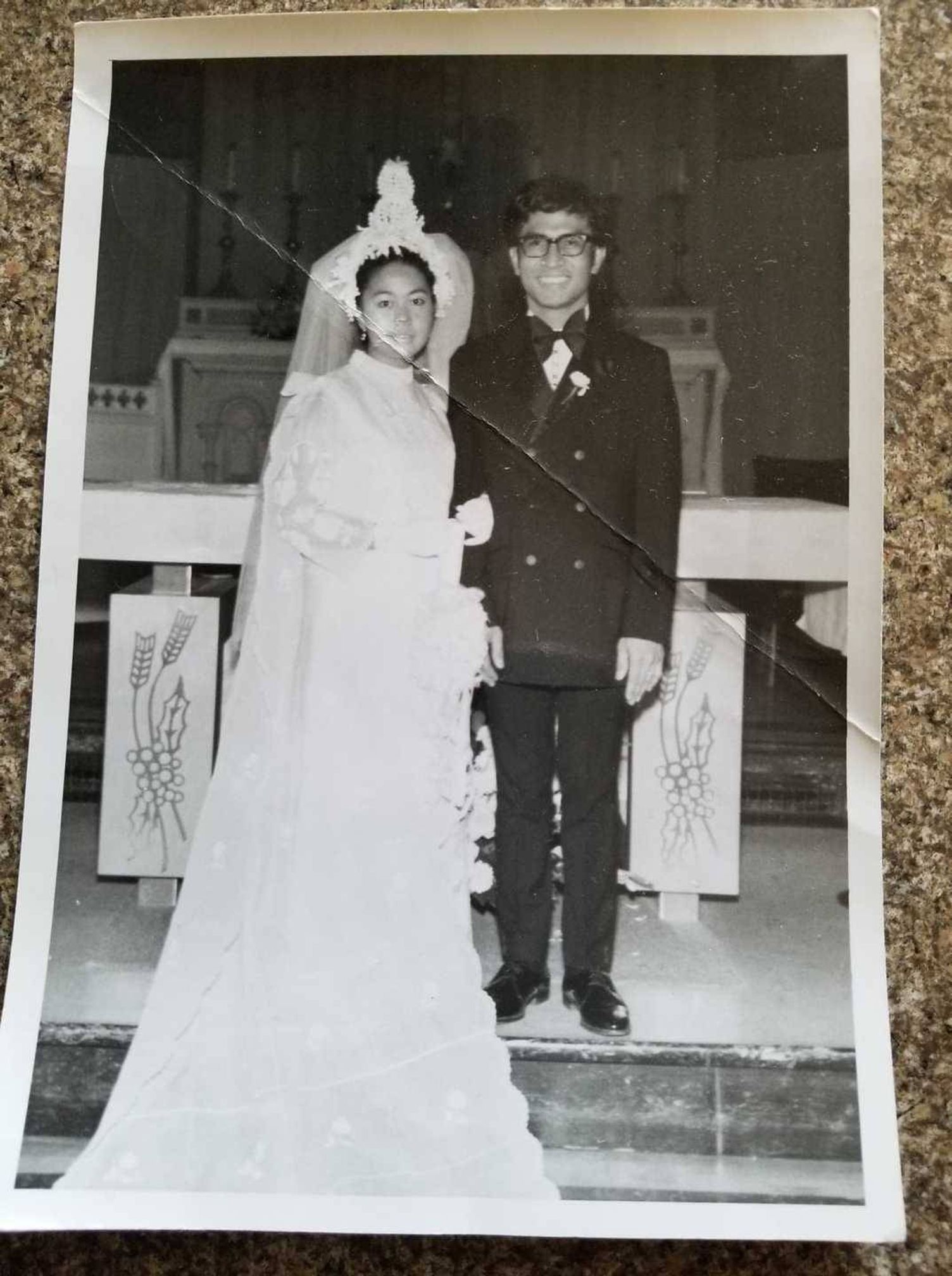 Couple dressed in wedding outfits