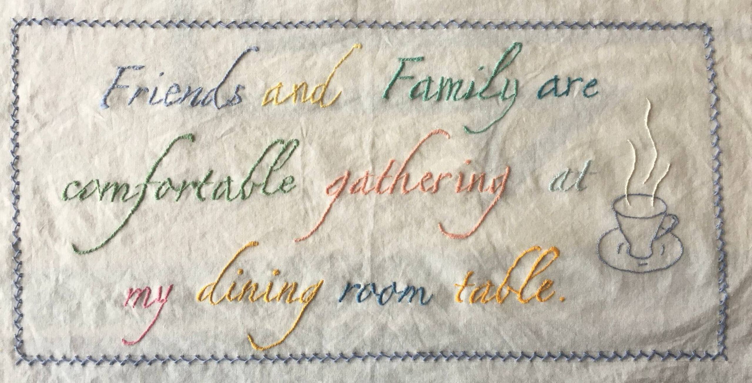 Embroidery Project 2020 example with the words - "Friends and Family are comfortable gathering at my dining room table" 