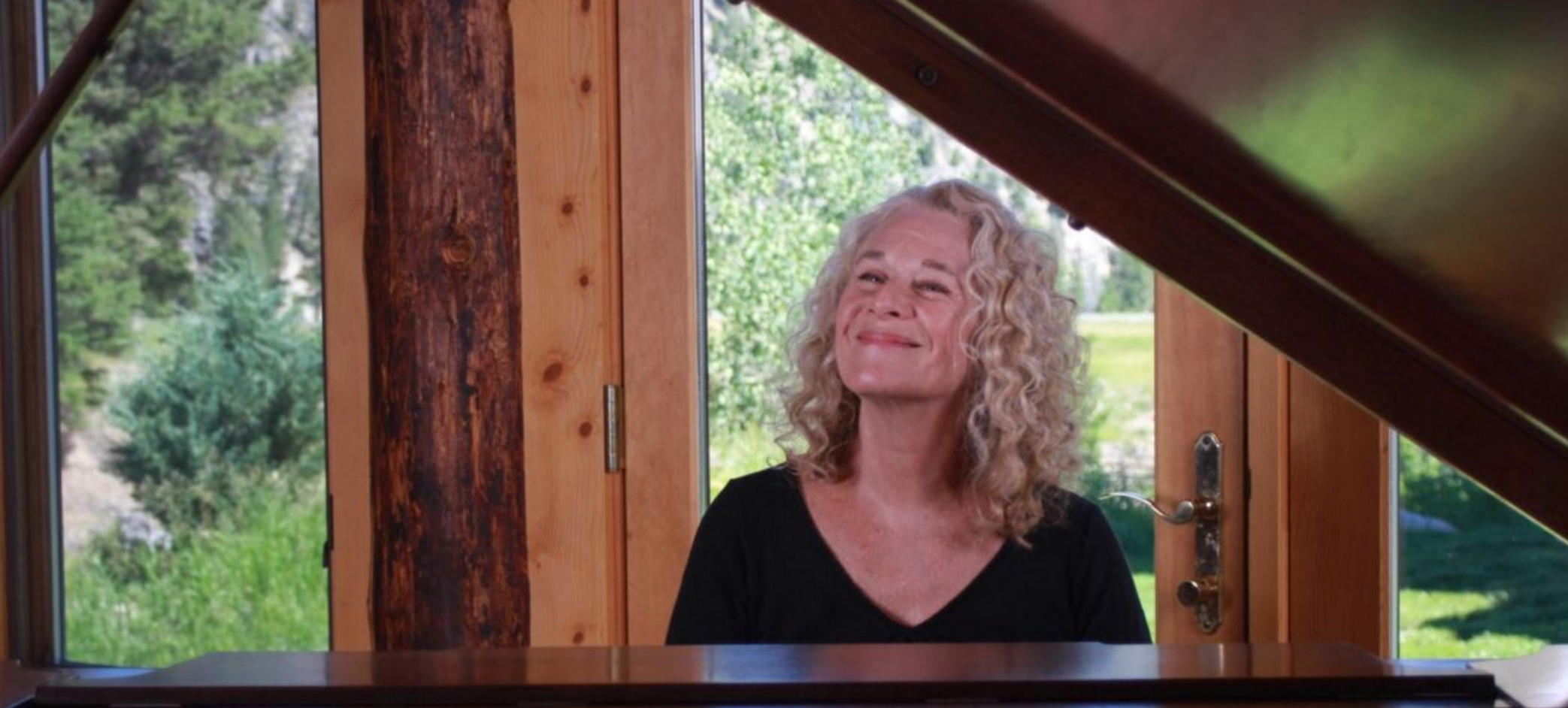 Carole King at piano
