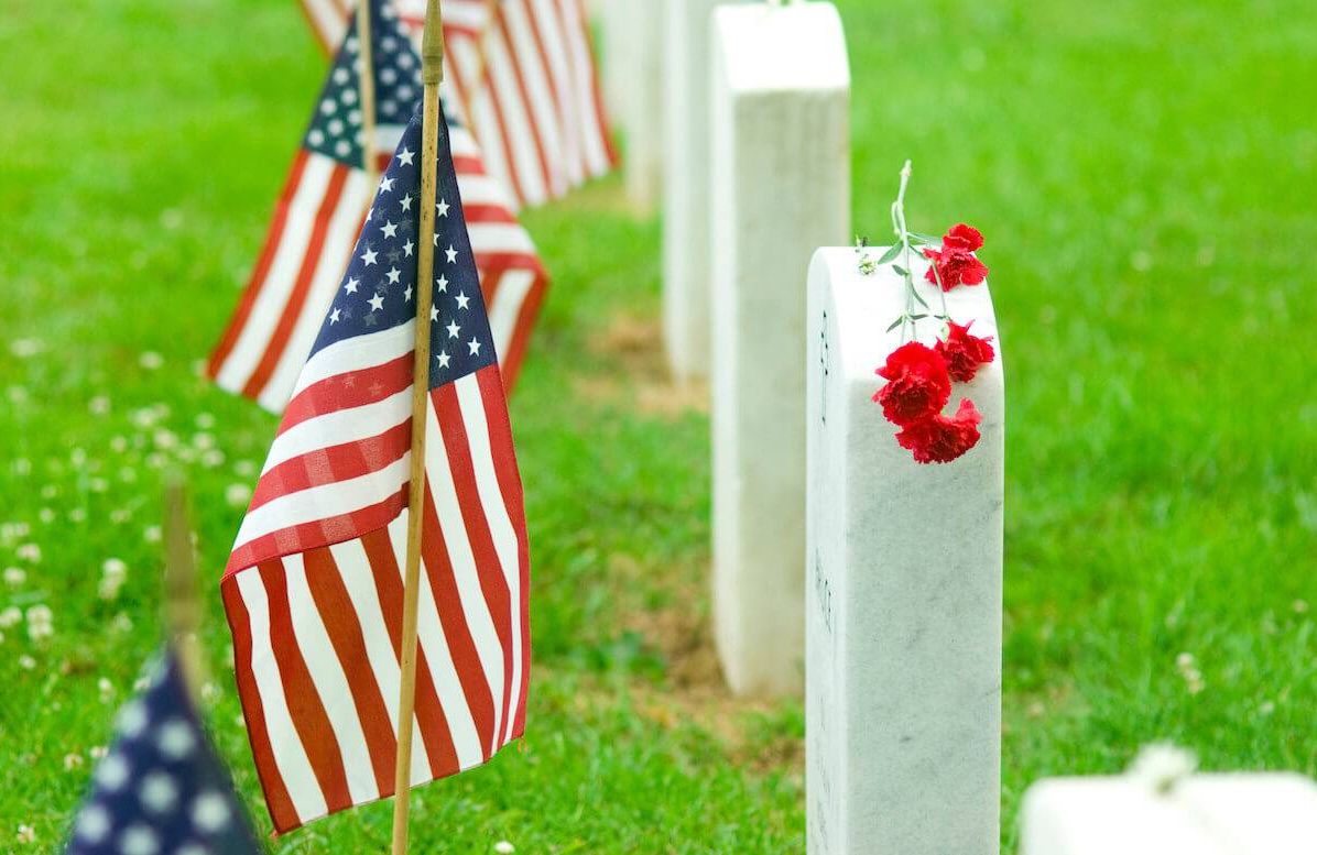 Graves with American flags