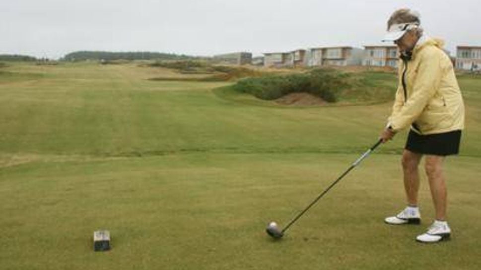 Mom teeing off at Cabot Links