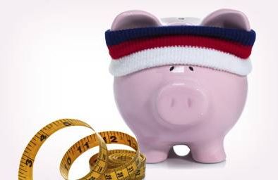 Piggy bank with sweatband and measuring tape