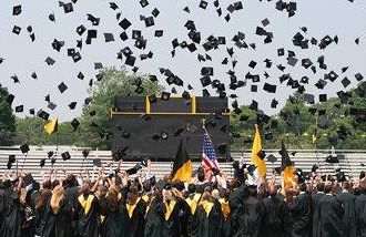 graduation caps in the air