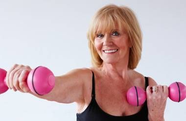 Woman exercising with weights