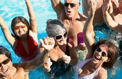 group of middle aged people in pool