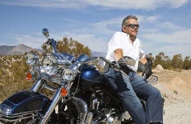 Senior man and his motorcycle