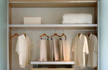 a neatly organized bedroom closet