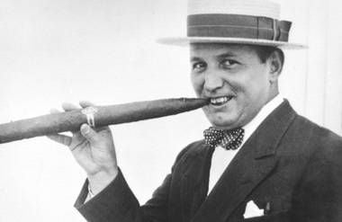 Robert Ripley in Brazil with a giant hand-rolled cigar