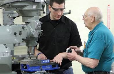 Machinist Stan Kulceski, right, now passes on his knowledge in Unretirement