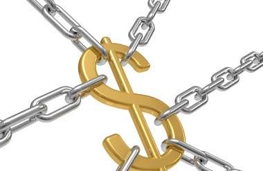 Dollar sign being pulled by chains