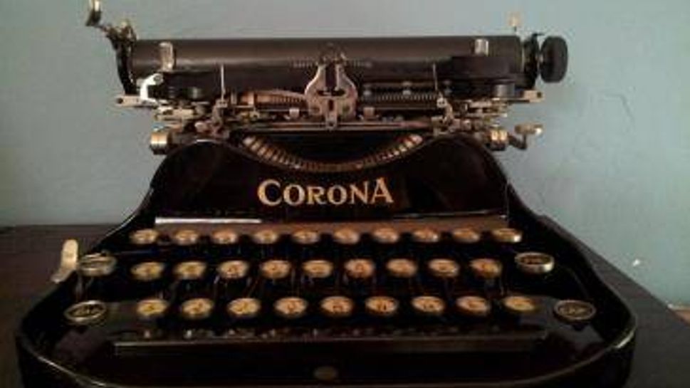 Old Corona typewriter used by traveling businessmen and journalists like Ernie P
