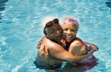 senior couple in swimming pool
