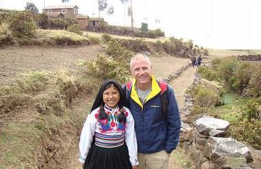 homestay traveller chris smith with his host sister on amantani island, lake tit