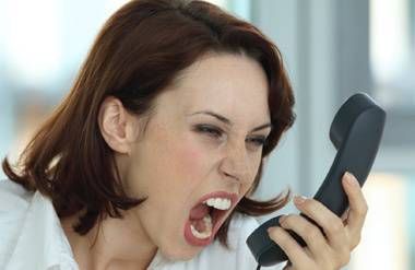 Woman screaming into phone