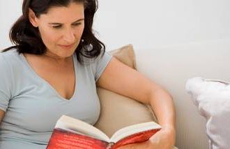 A woman reading alone