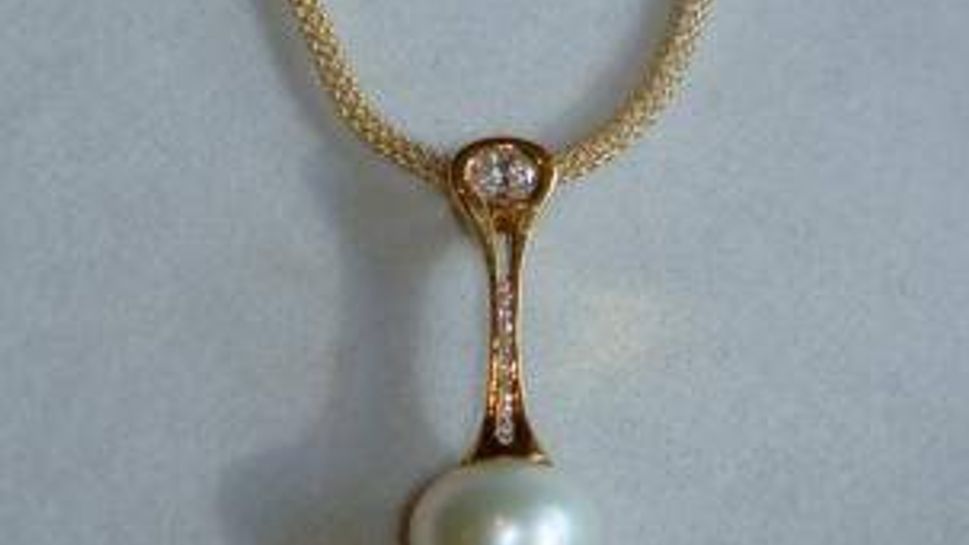 white south sea pendant on gold chain