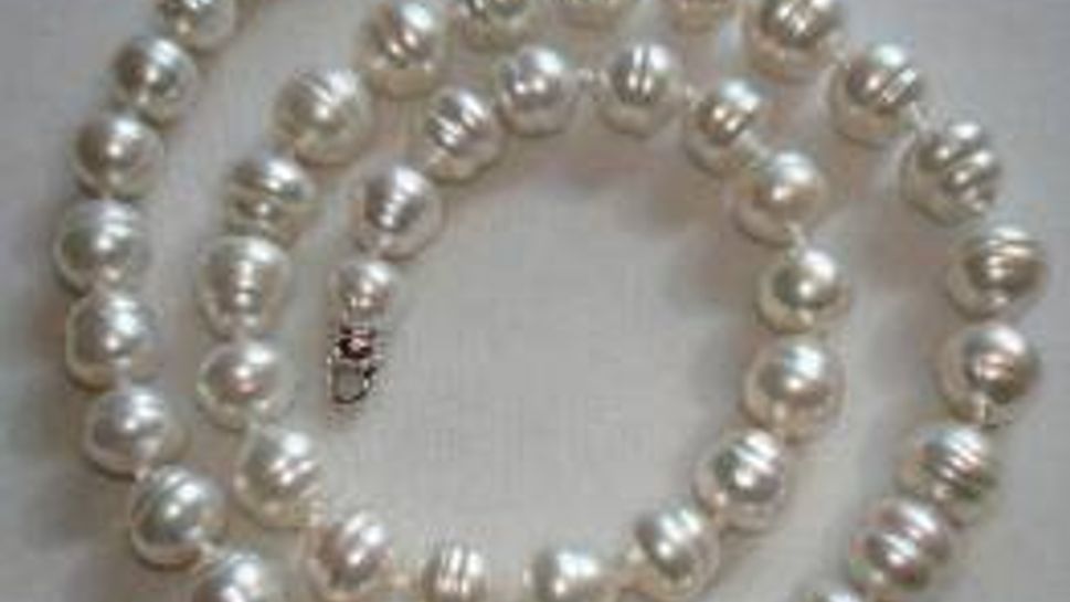 14 karat gold and 14 karat white gold accent south sea strand pearls