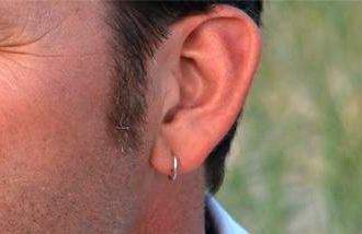 One man sought inspiration during a midlife crisis with an ear piercing. 