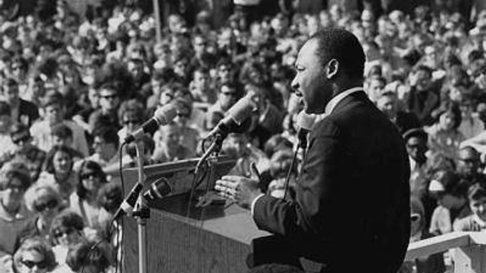rev. dr. martin luther king giving a speech