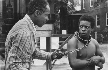 Fiddler offers sage advice to Kunta Kinte in the 1977 miniseries "Roots."