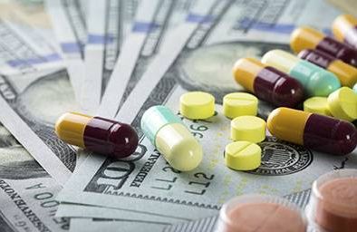 Prescription medicine spilled over money