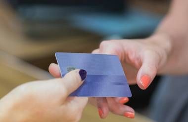 Customer handing over credit card