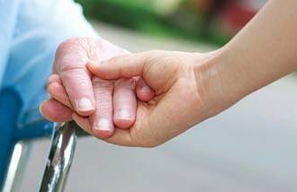 Should you compensate a family member to care for Mom or Dad?