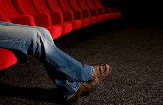 A man alone at the movies.