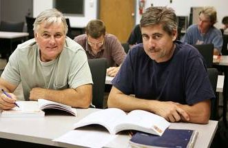 older male students in a classroom