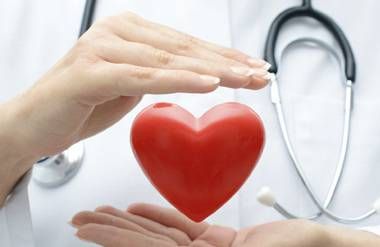 Doctor's hands with heart
