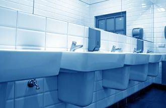 Be careful in a public bathroom to avoid germs with these tips.