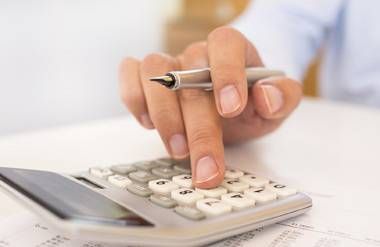 Man calculating his finances