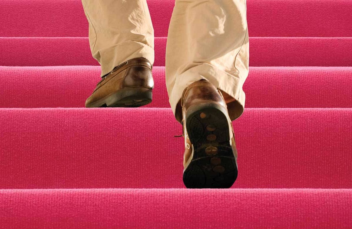 Man going up stairs