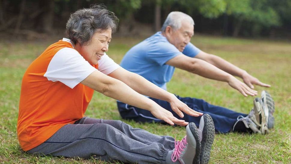 Couple stretching together