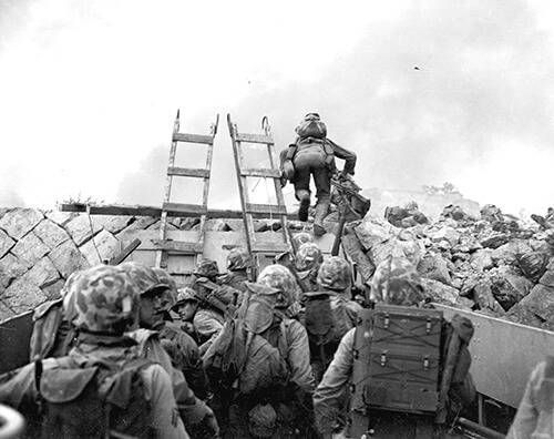 As against “The shores of Tripoli” in the Marine Hymn, Leathernecks use scaling ladders to storm ashore at Inchon in amphibious invasion September 15, 1950. It was one of the fastest operations on record. Perfectly timed, with waves of Marines almost stumbling over the preceding ones. The attack was so swift that casualties were surprisingly low.