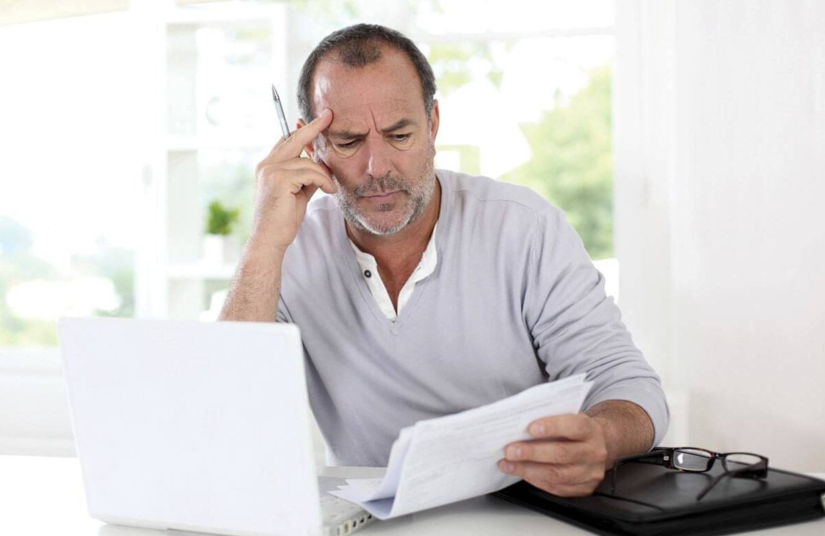 Man reviewing options