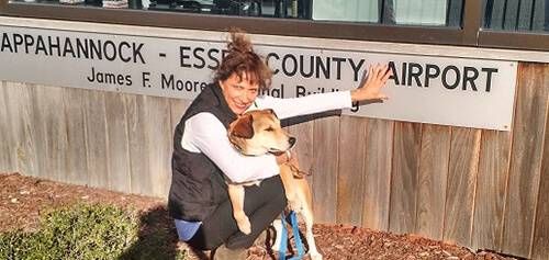 Writer Judith Reitman-Texier at Tappahannock Airport with Heather.