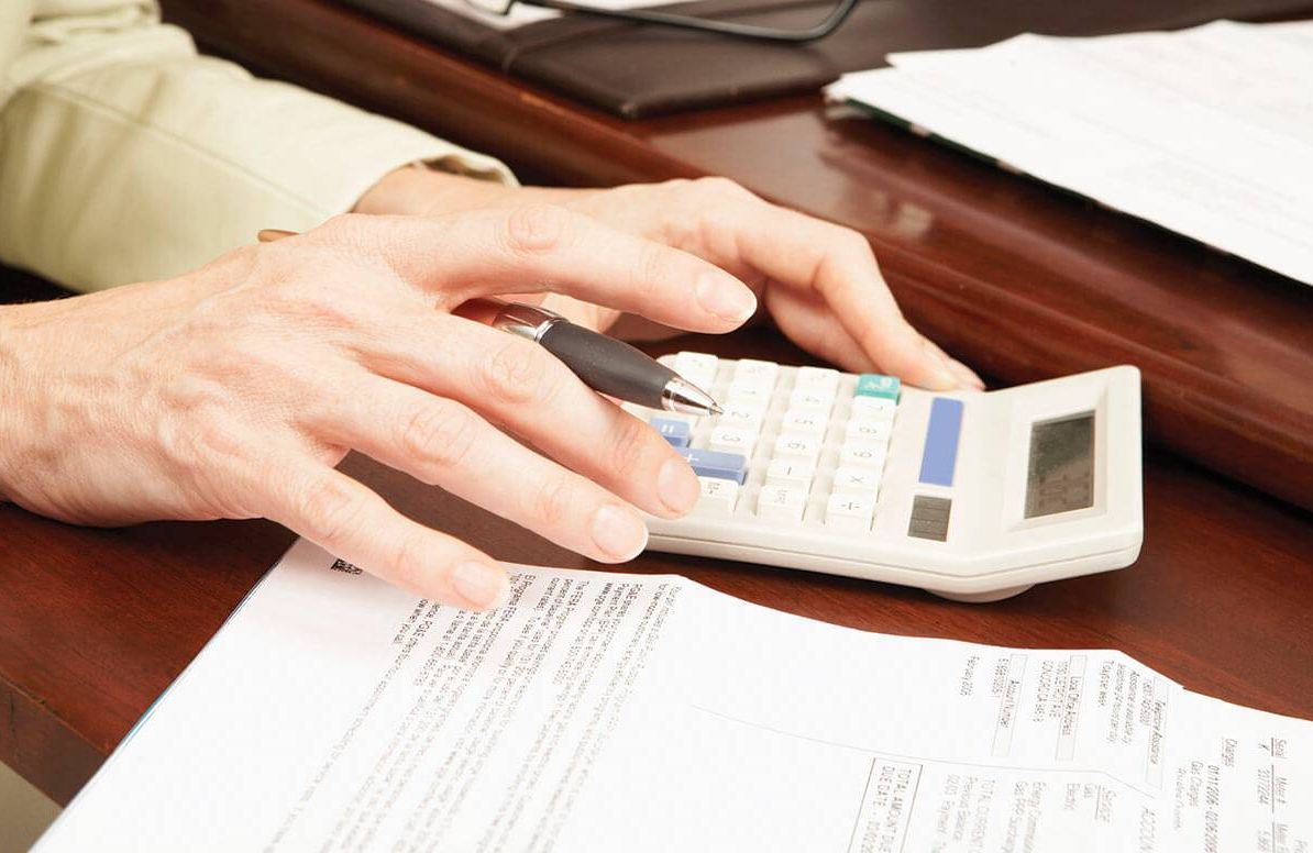 Woman calculating finances