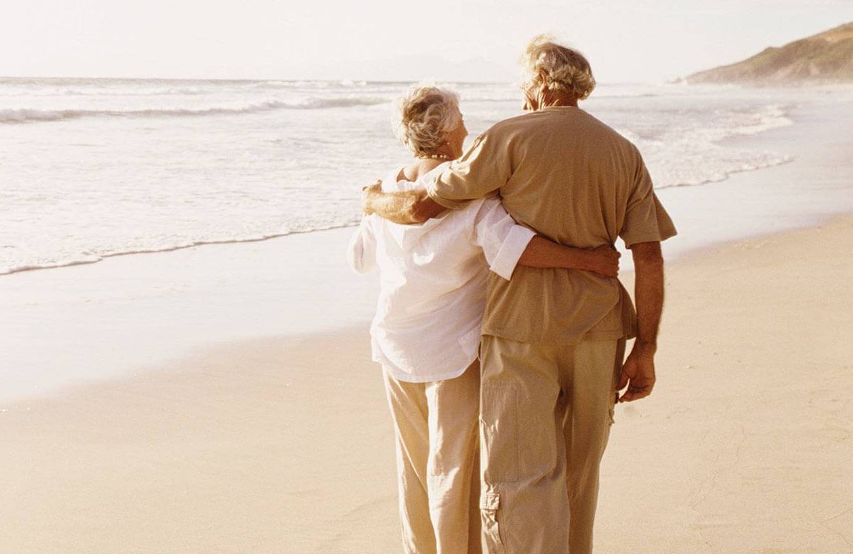 Retired couple on the beach