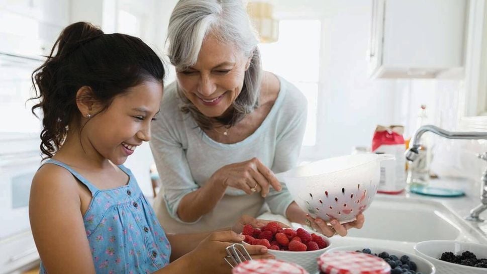 Woman baking with child