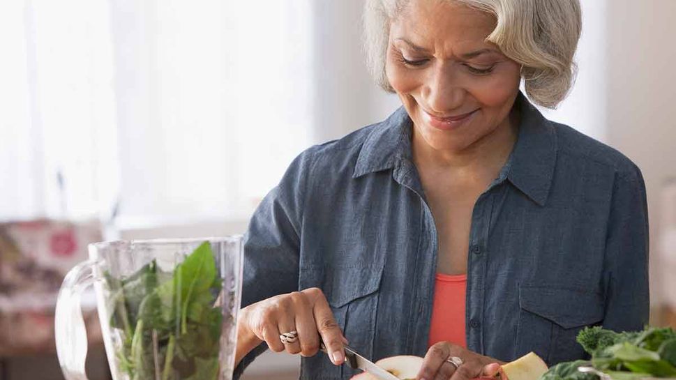 Woman prepping healthy foods