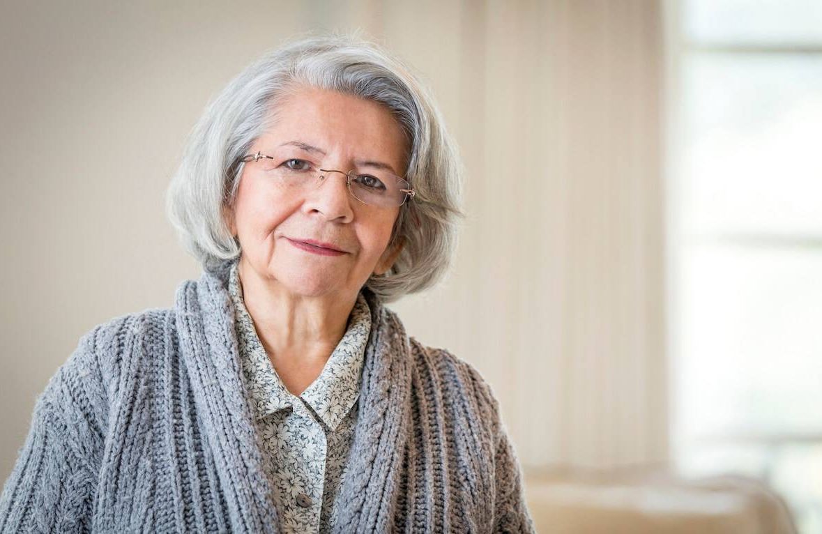 Close up of serious face of older Hispanic woman