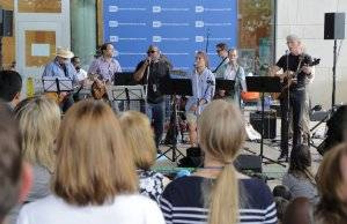 Dr. Francis Collins (far right) plays guitar in the Affordable Rock ‘n’ Roll Act.