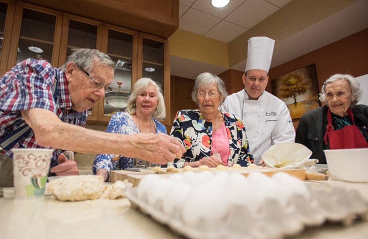 Residents of United Hebrew’s assisted living and memory care community in New Rochelle, N.Y., learn how to make pasta from the facility’s head chef