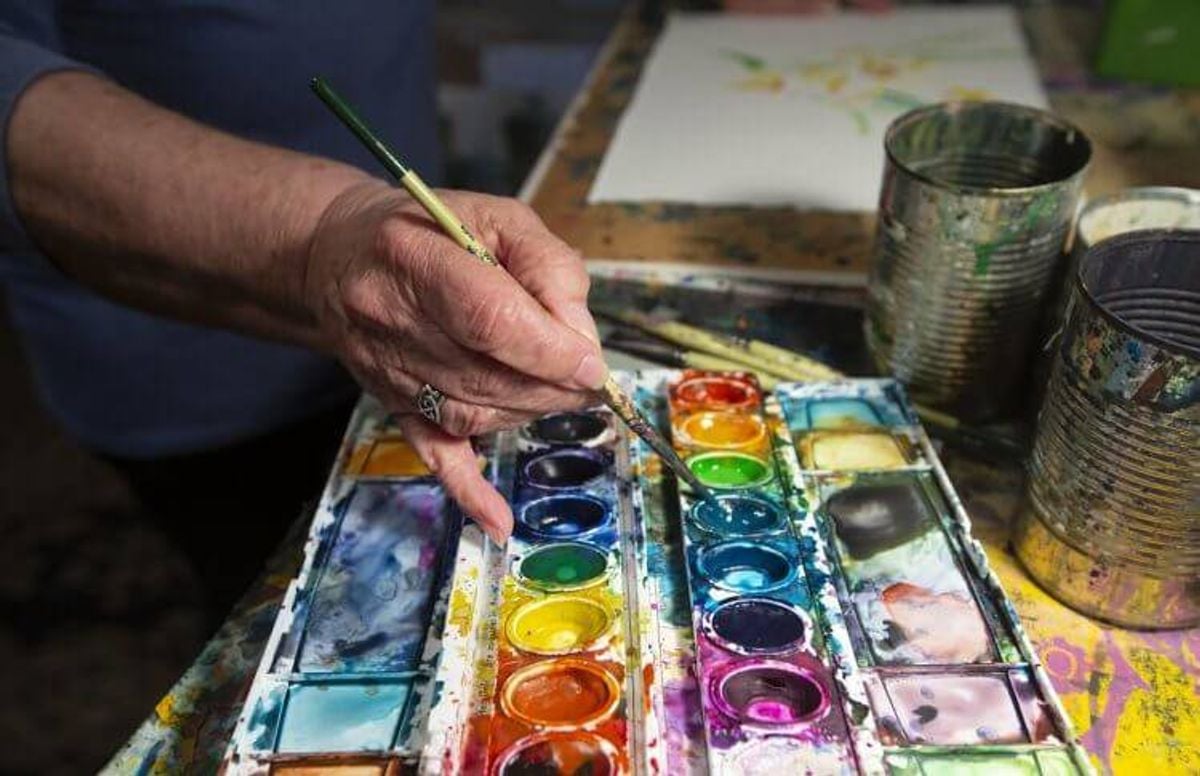 Artist Marilynne Bradley at home in Webster Groves, working on a painting. A close up of her paints that she prefers.