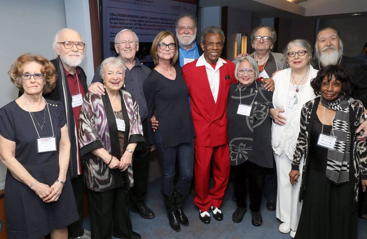 Actors including Len Cariou and 2019 Tony Award nominee Andre DeShields (in red) gather with guests and organization members at the PAL launch event. Joan Jeffri, director of The Actors Fund Research Center for Arts and Culture is at far left.