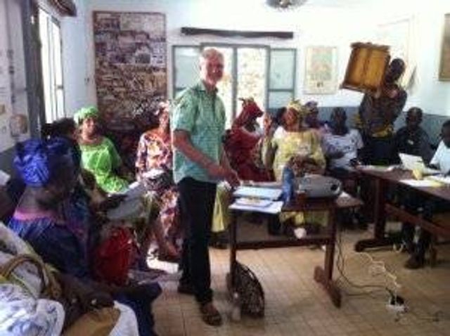 Greg Polk presents at a workshop on marketing and label design. Participants were owners of various food processing co-ops in Sikasso, Mali. 