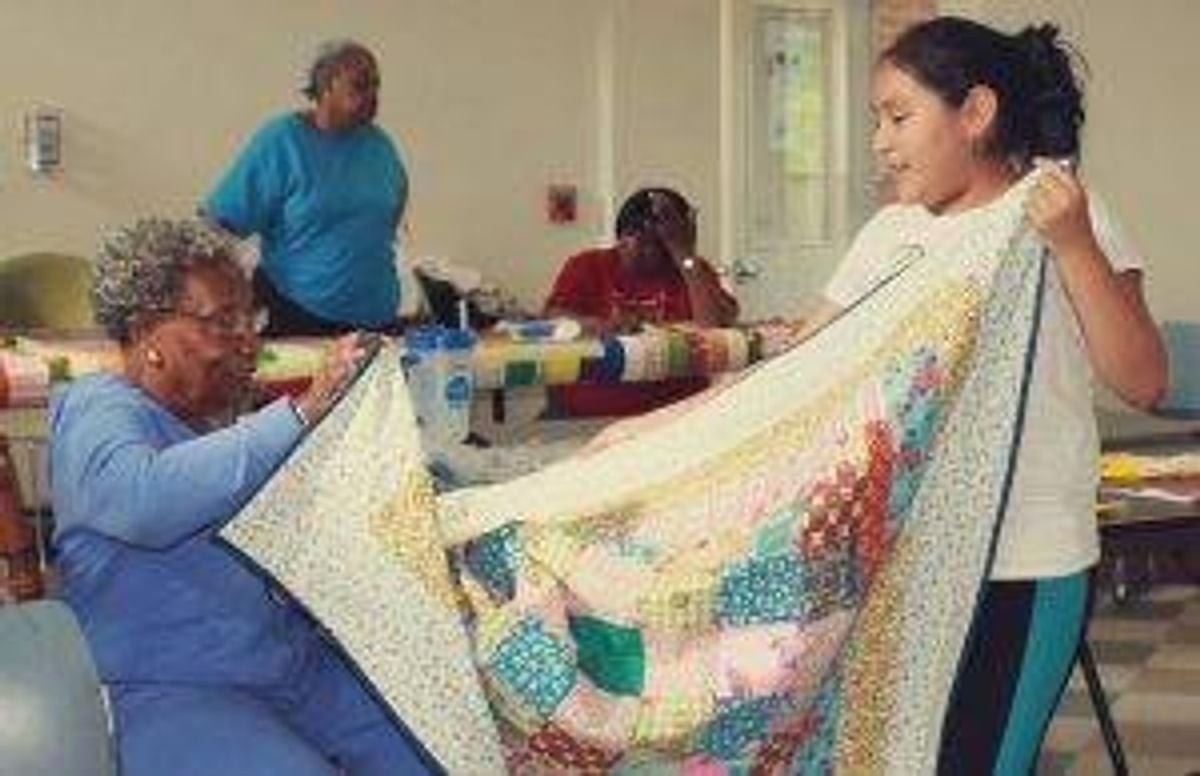 In the Community Room, aka “The Quilt House”