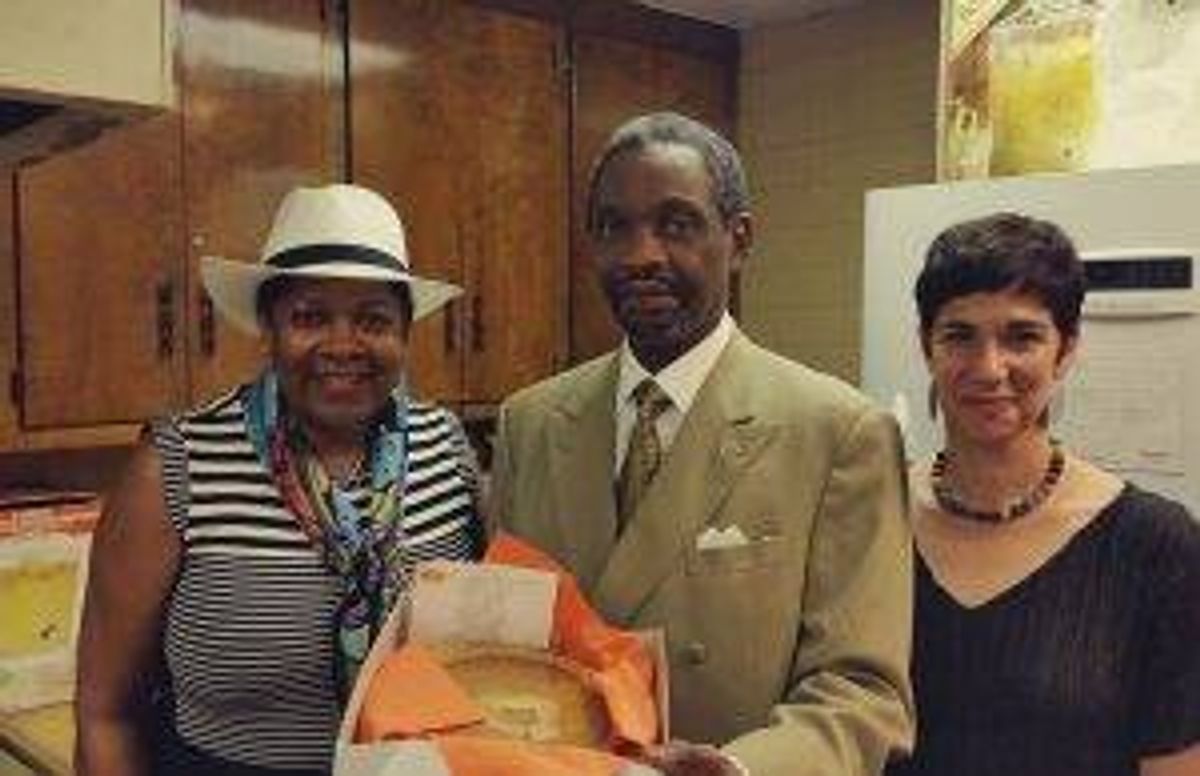 At Mother Emanuel AME Church in Charleston, S. C., Rose and Rev. Dr Norvel Goff, Sr. and Eden Bart, a Sweet Potato Comfort Pie volunteer