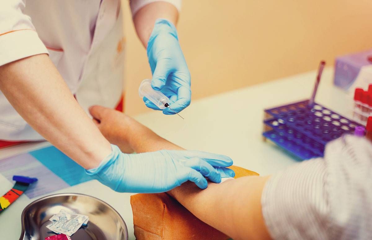 a person getting their blood drawn